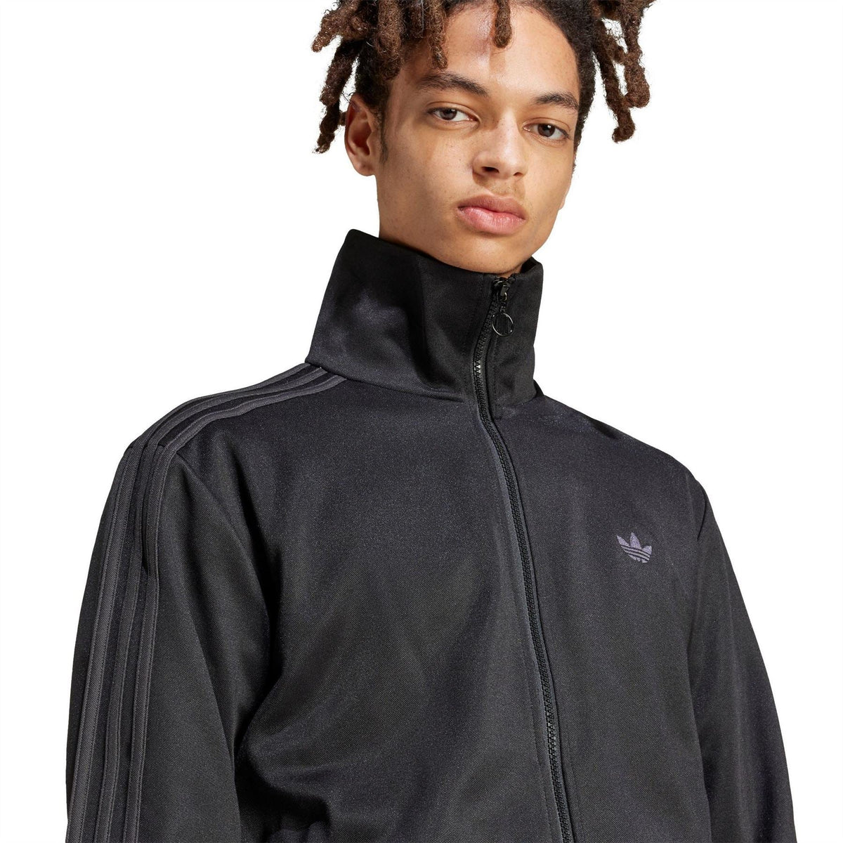 Adidas Originals BB TT tracksuit in black, featuring a sporty design with the iconic Adidas logo on the chest and matching pants.