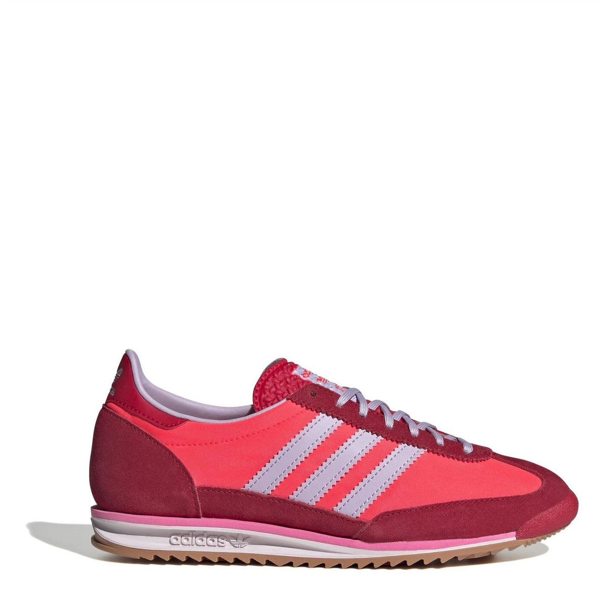 adidas Originals Sl72 shoes in white with black accents, showcasing classic sneaker design and breathable fabric upper.