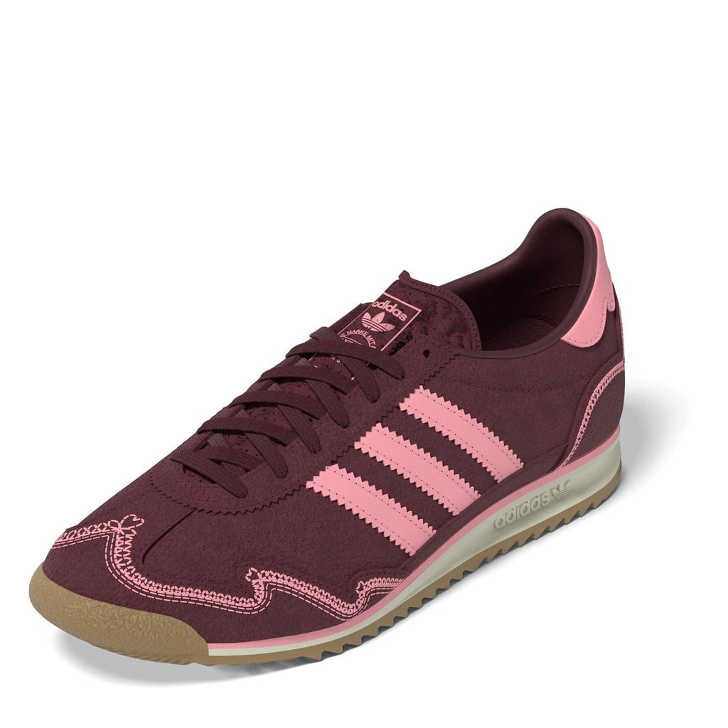 adidas Originals Sl72 shoes in white with classic design, featuring suede and canvas upper, rubber sole, and iconic branding.