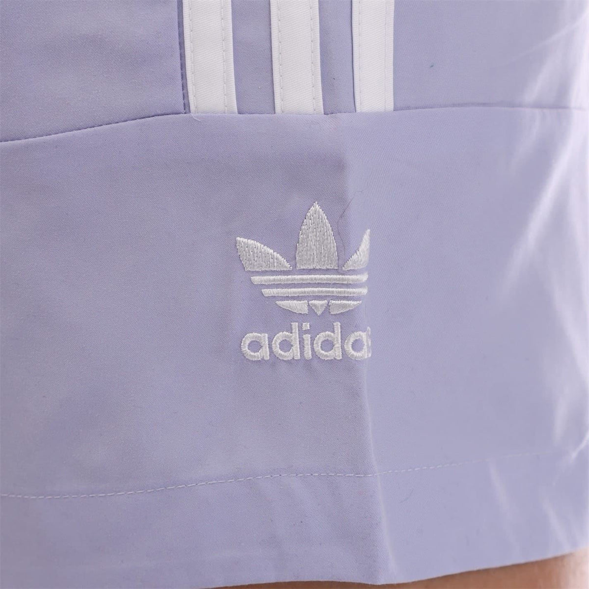 adidas Originals Lockup Swim Shorts with elasticated waistband, lightweight swimwear for men or women, featuring a casual sporty style