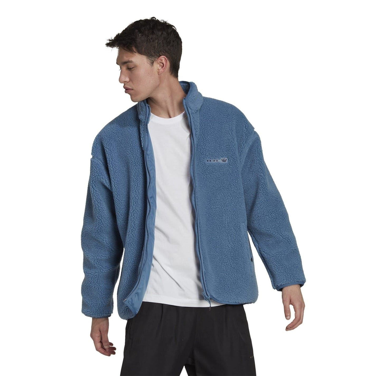 adidas Originals Sherpa Jacket sweatshirt featuring a cozy, plush interior and classic design, shown in a front view.