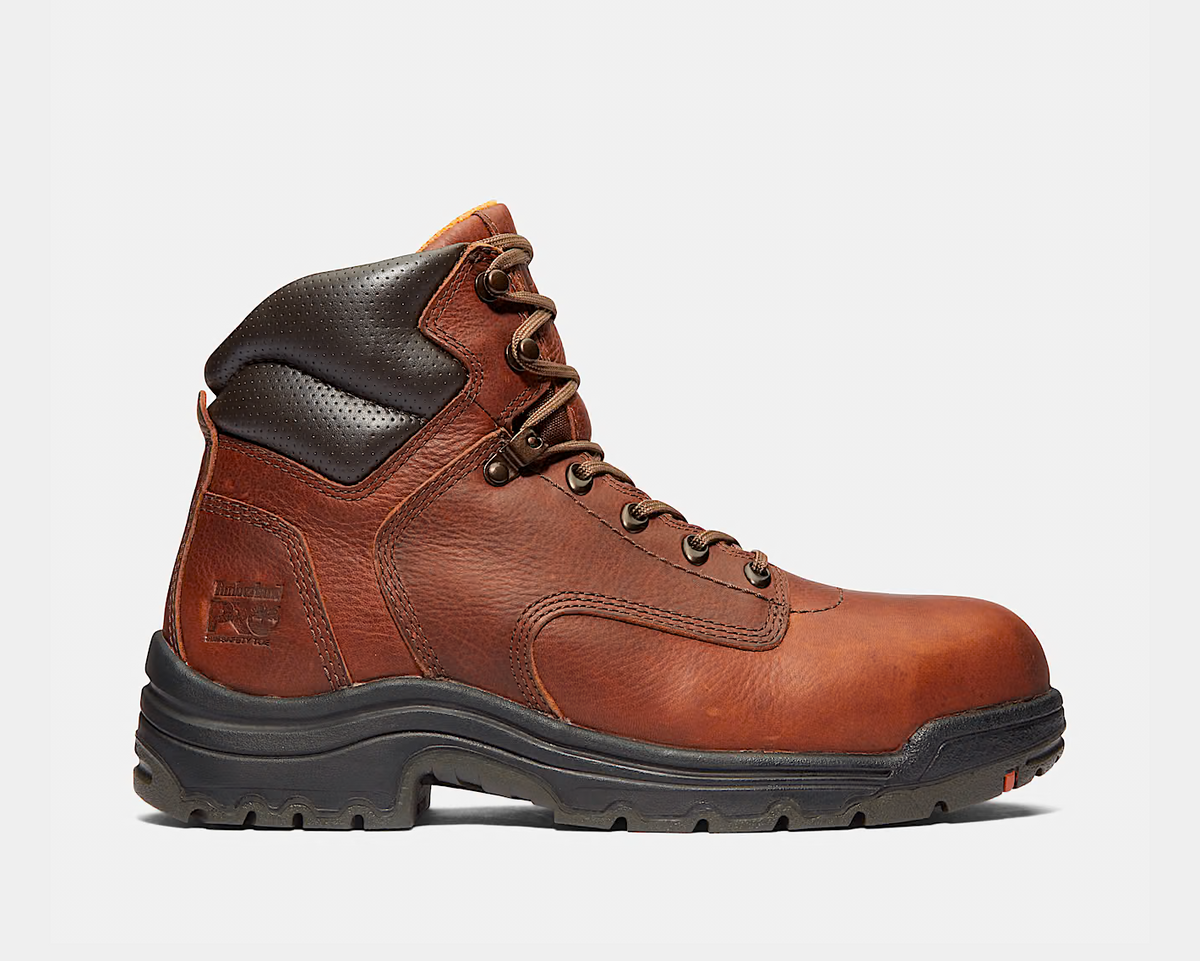 Brown lace-up safety toe work boot with perforated panels and thick rubber sole