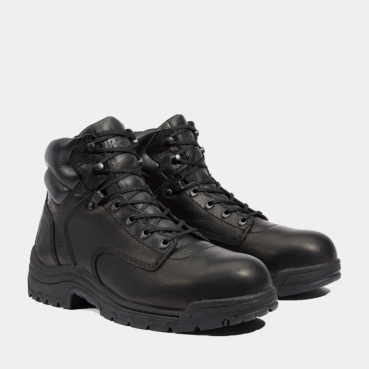 Black lace-up safety toe work boots pair with padded collars and textured leather