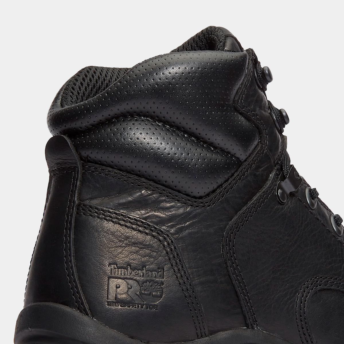 Black leather safety toe work boot with Timberland logo patch and padded ankle