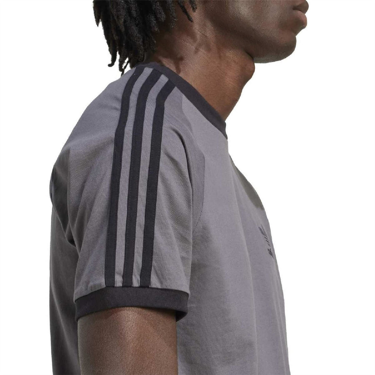 adidas Originals Adicolor Classics 3-Stripes T-Shirt featuring white fabric and iconic three-stripe design on the front.