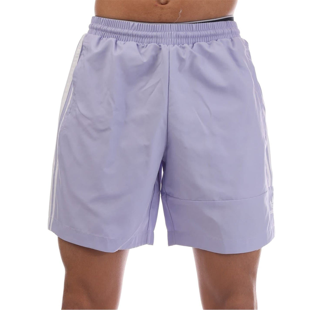 adidas Originals lockup swim shorts with elasticated waistband, navy blue color, front view, casual swimwear for men