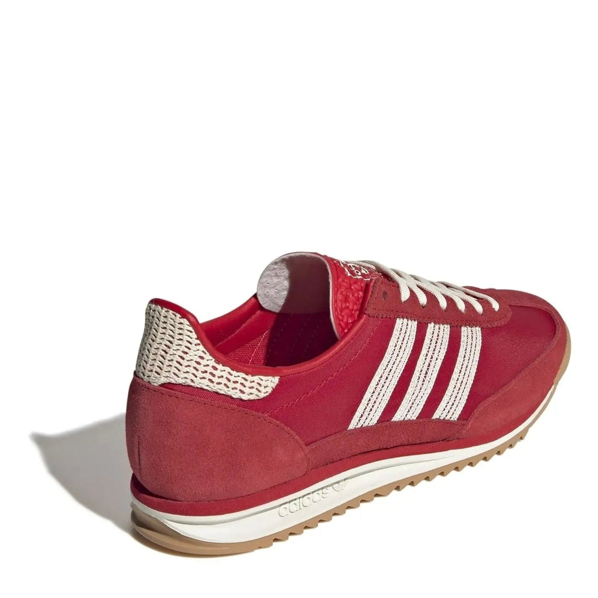 adidas Originals Sl72 shoes in white with classic design, featuring lace-up closure and retro athletic style.